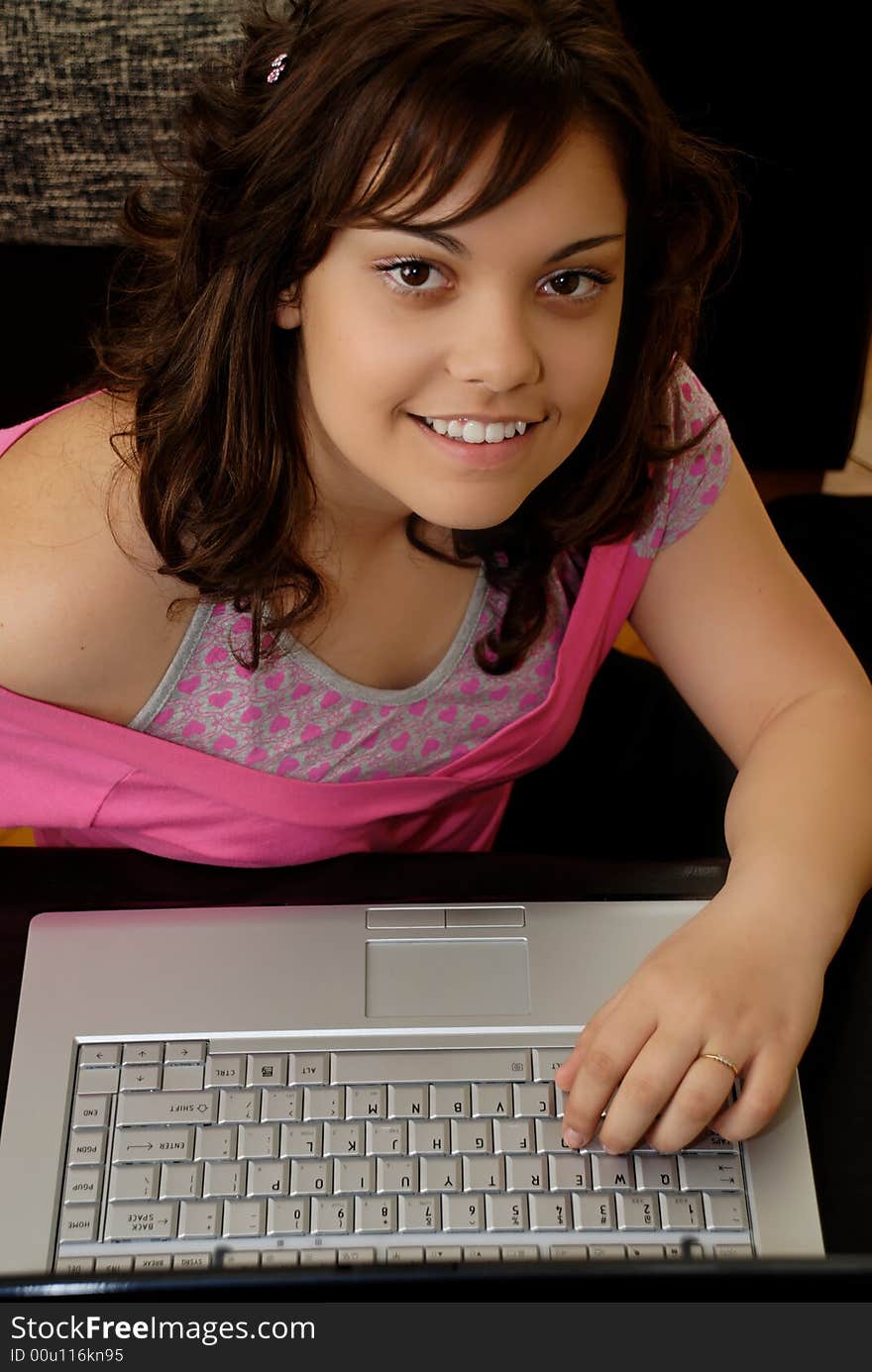 Teenage girl with laptop