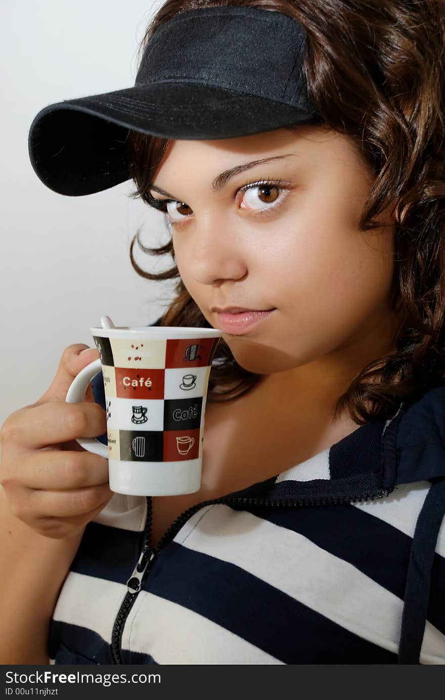 Teenage girl with mug