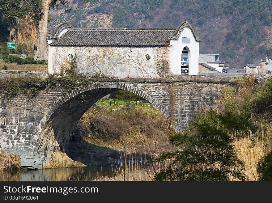 A beautiful old stone bridge in rural China. A beautiful old stone bridge in rural China