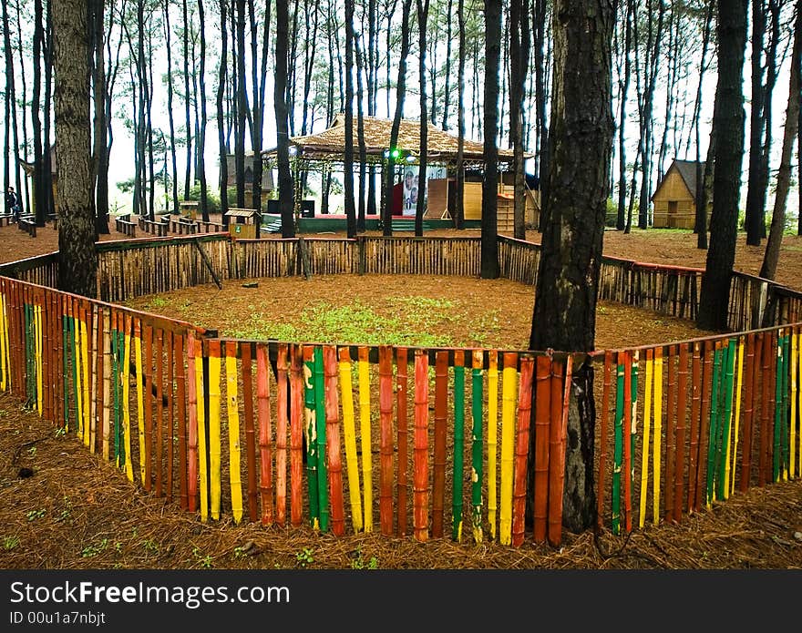 The colored parapet is in woods. The colored parapet is in woods