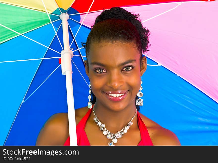 African girl with a colorful umbrella