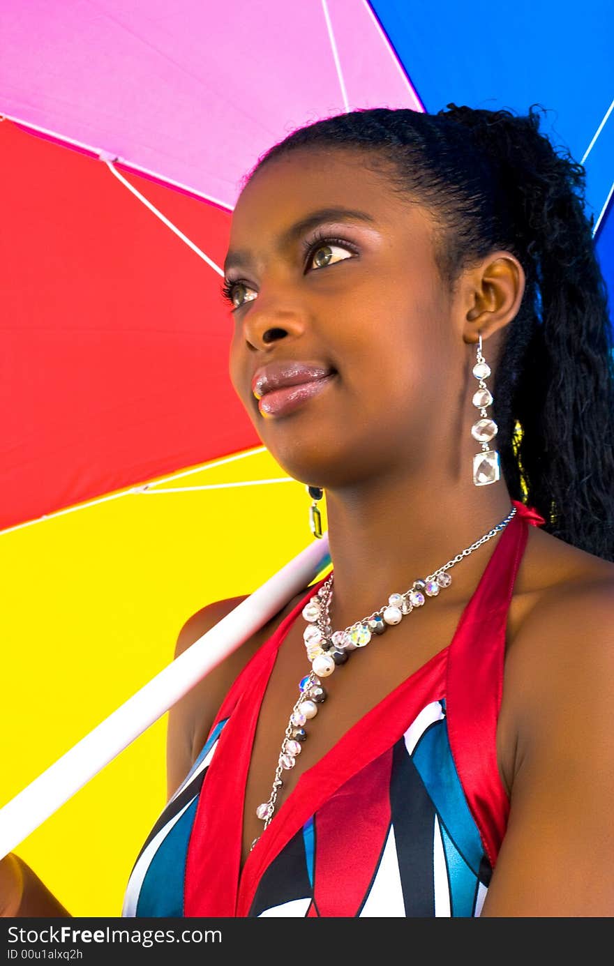 African girl with a colorful umbrella