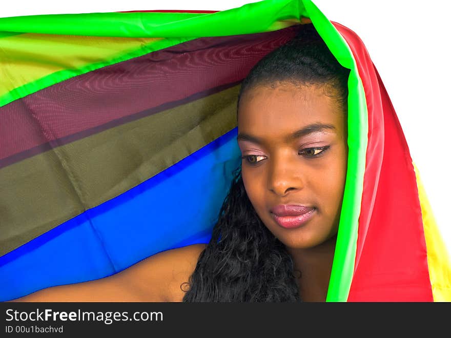 African girl wrapped in a colorful shawl