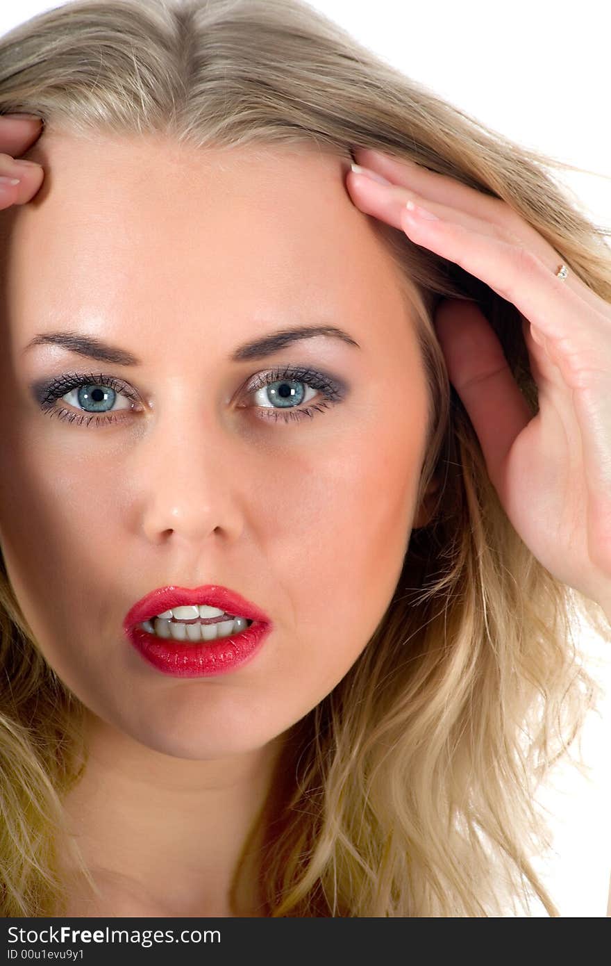 Portrait of the blonde with blue eye on white background