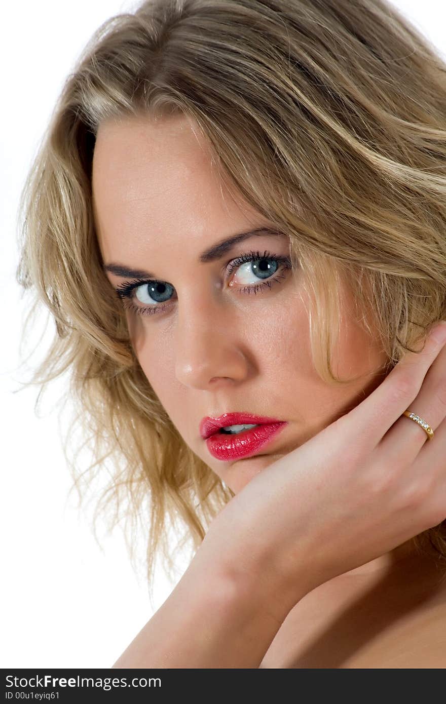 Portrait of the blonde with blue eye on white background