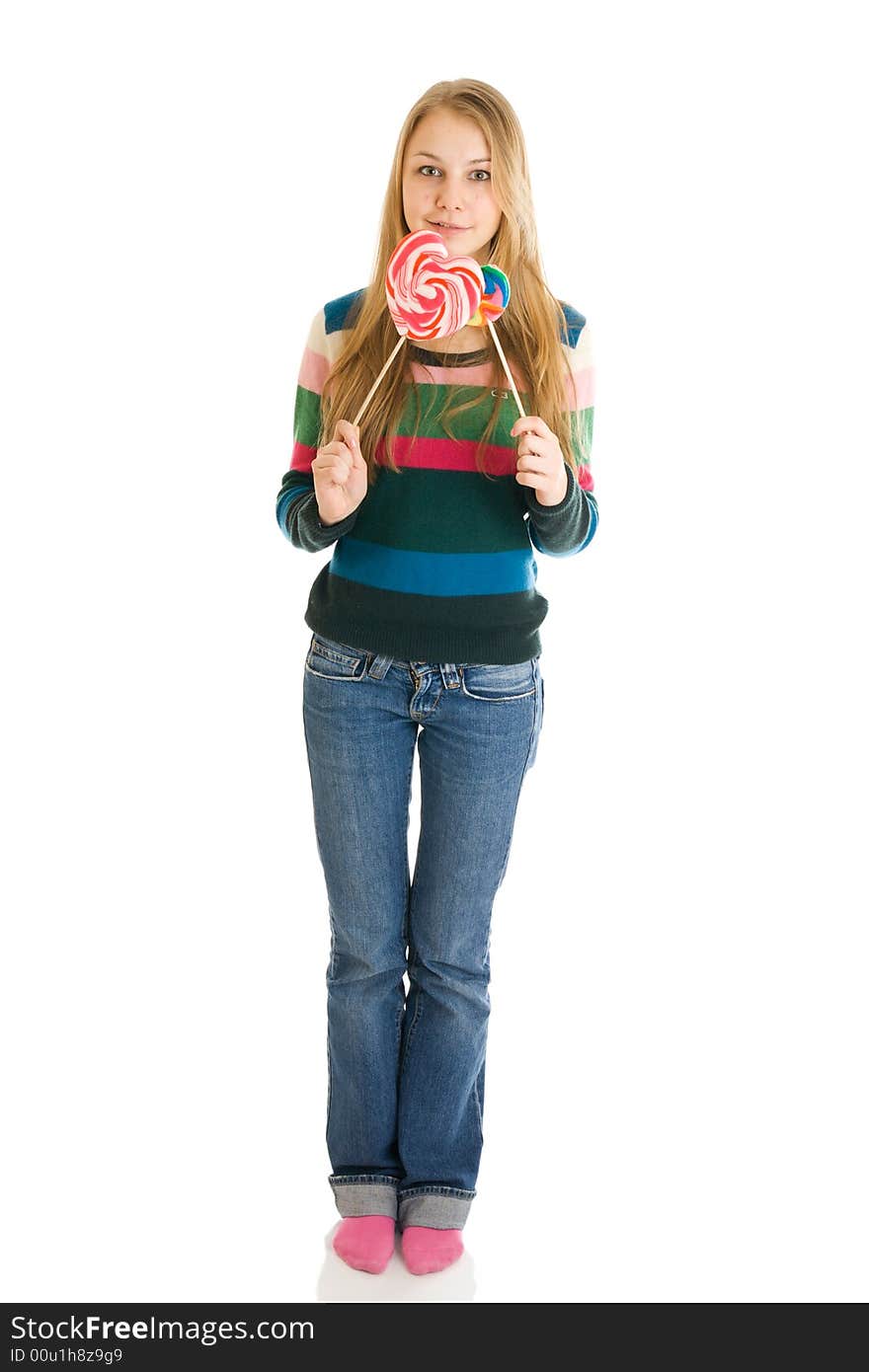 The girl with a sugar candy isolated on a white background