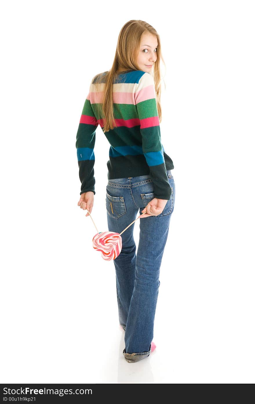 The girl with a sugar candy isolated on a white background