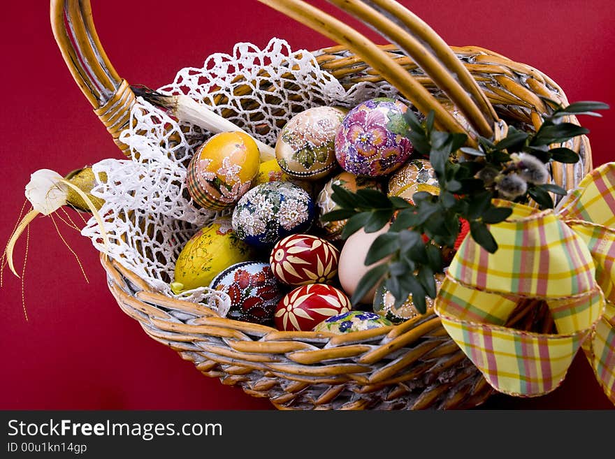 Easter eggs in a traditional easter basket. Easter eggs in a traditional easter basket