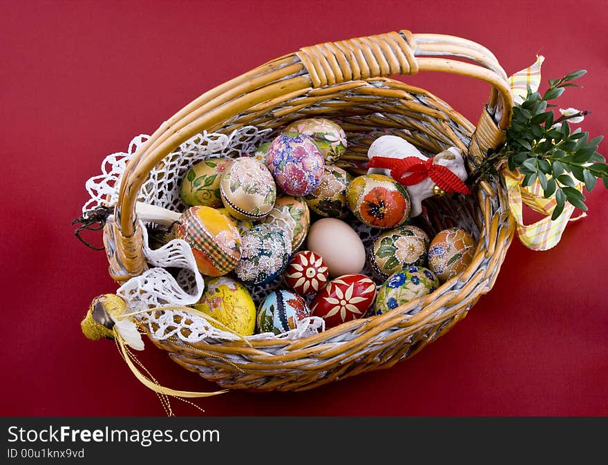 Easter eggs in a traditional easter basket. Easter eggs in a traditional easter basket