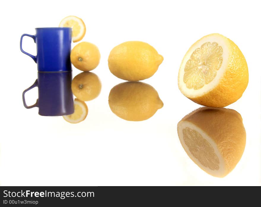 Diagonal shot of a lemons and blue mug 3