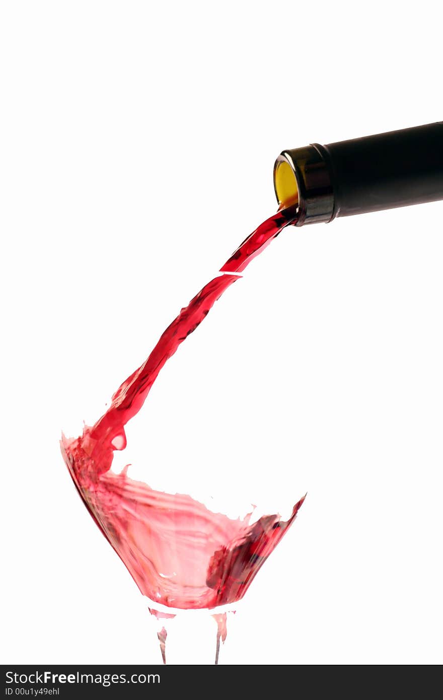 Red wine with a bottle on a withe background.