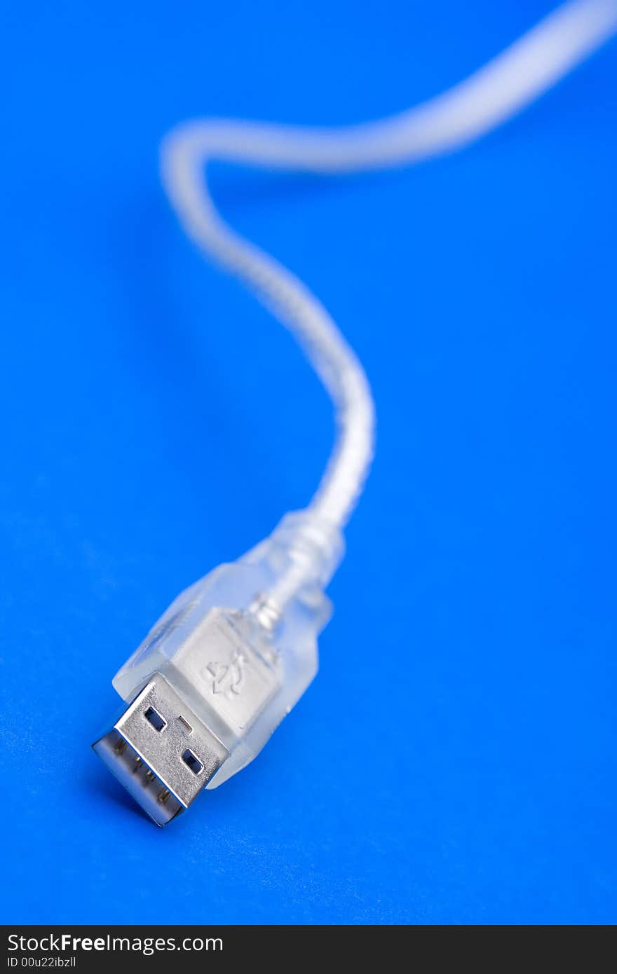 Transparent USB Cable against the blue background