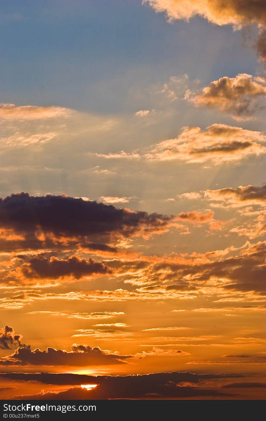 Veiw series: orange sunset with clouds and blue sky