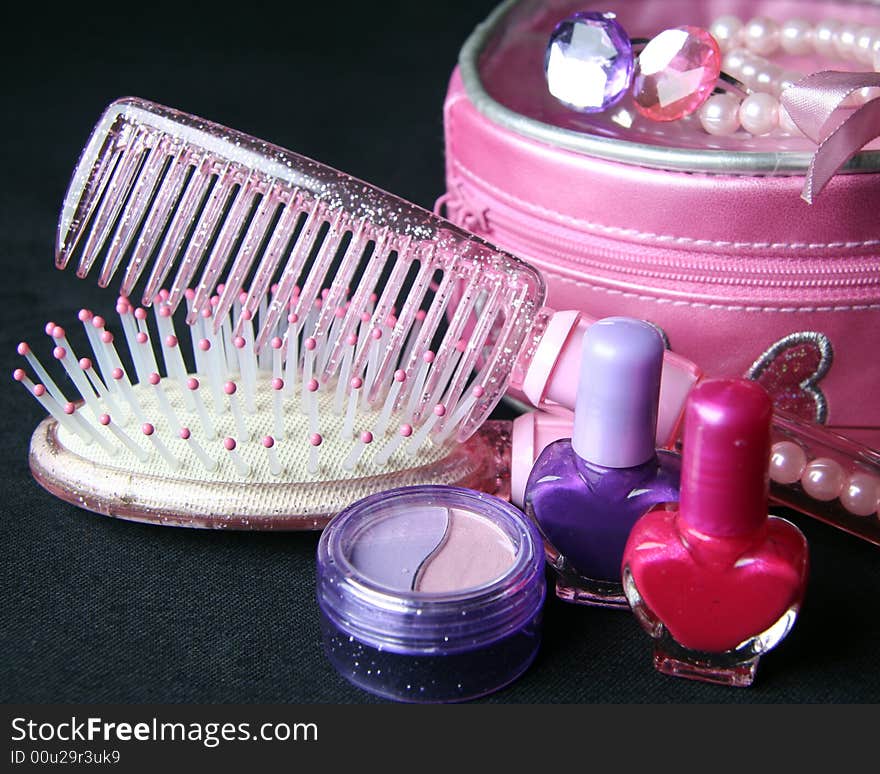 Women´s accessories, comb, brush, ring and make up, nail enamel. Women´s accessories, comb, brush, ring and make up, nail enamel