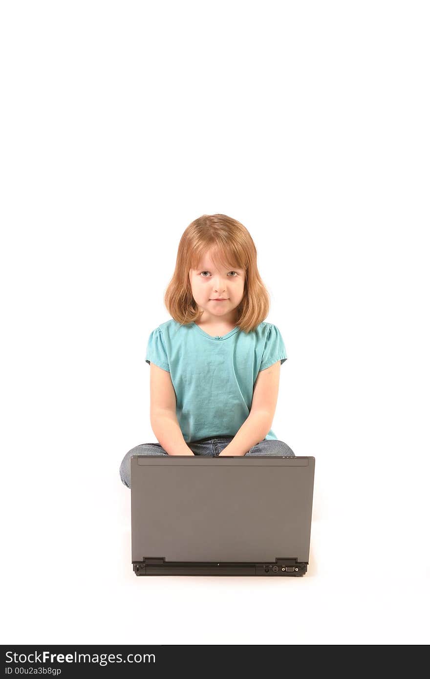 Isolated young girl using a laptop