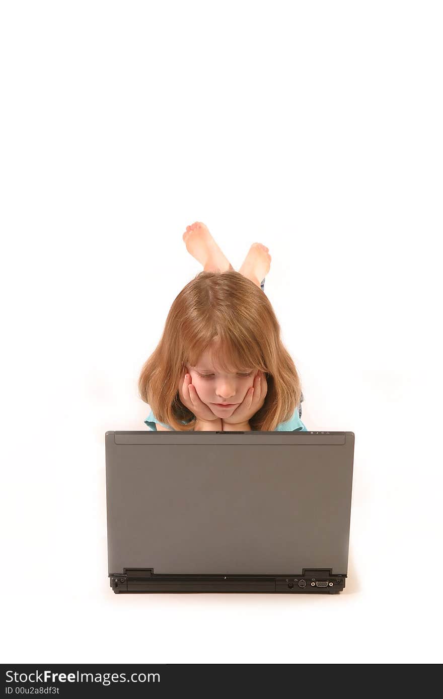 Isolated young girl using a laptop