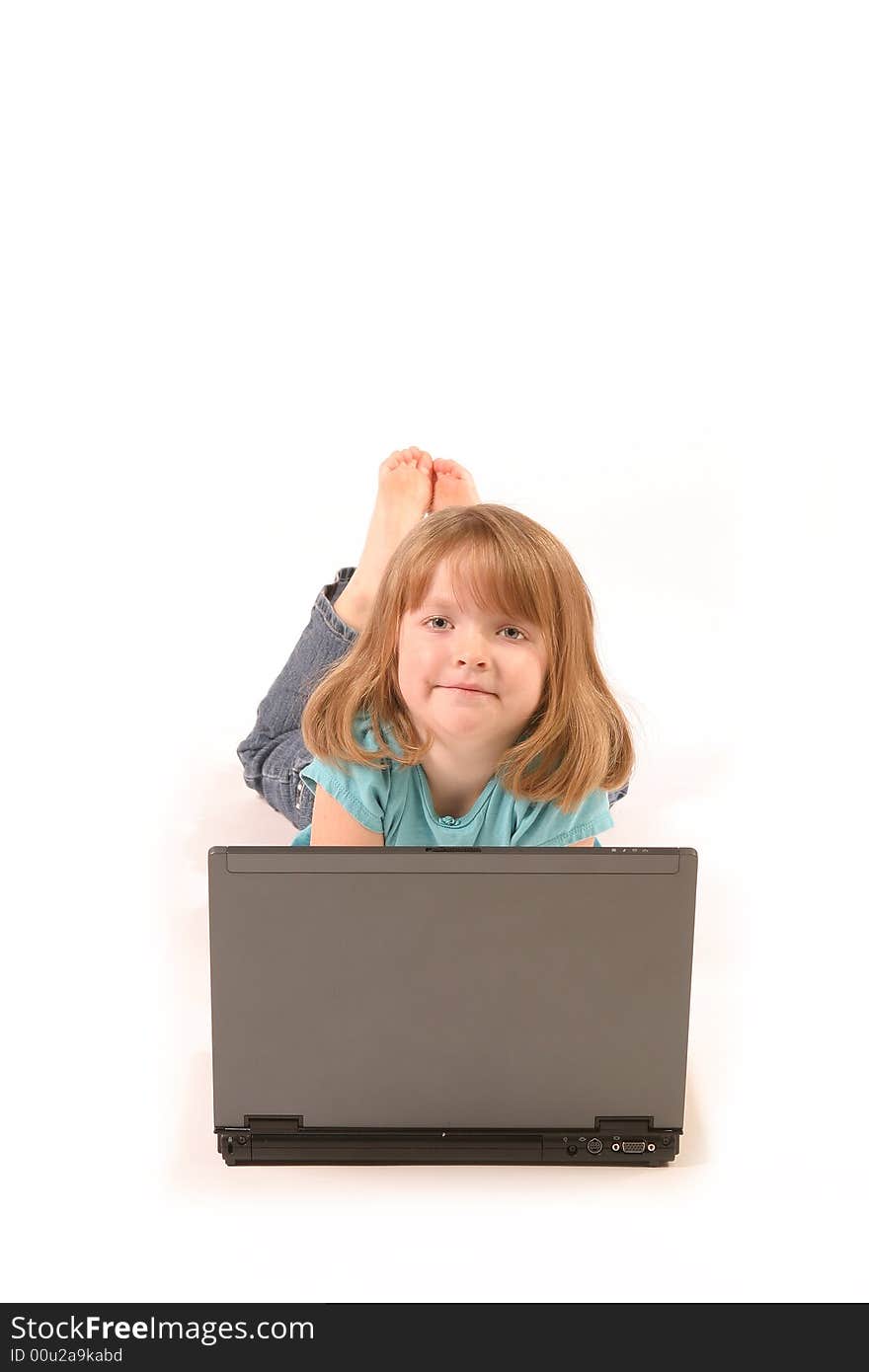 Isolated young girl using a laptop