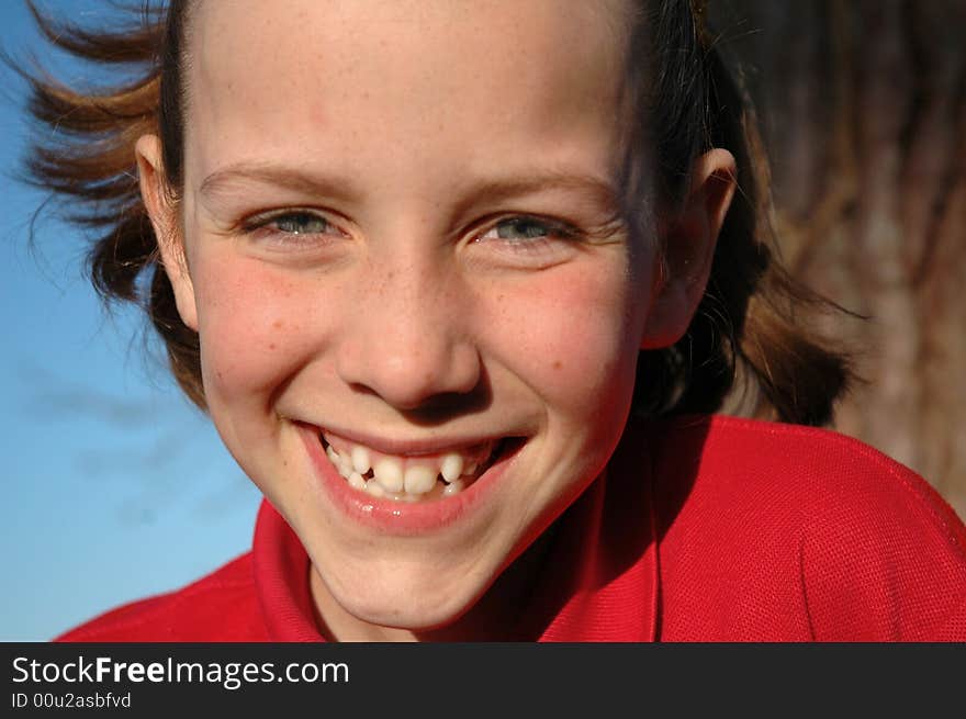 Close-up natural portrait of cheeky girl. Close-up natural portrait of cheeky girl