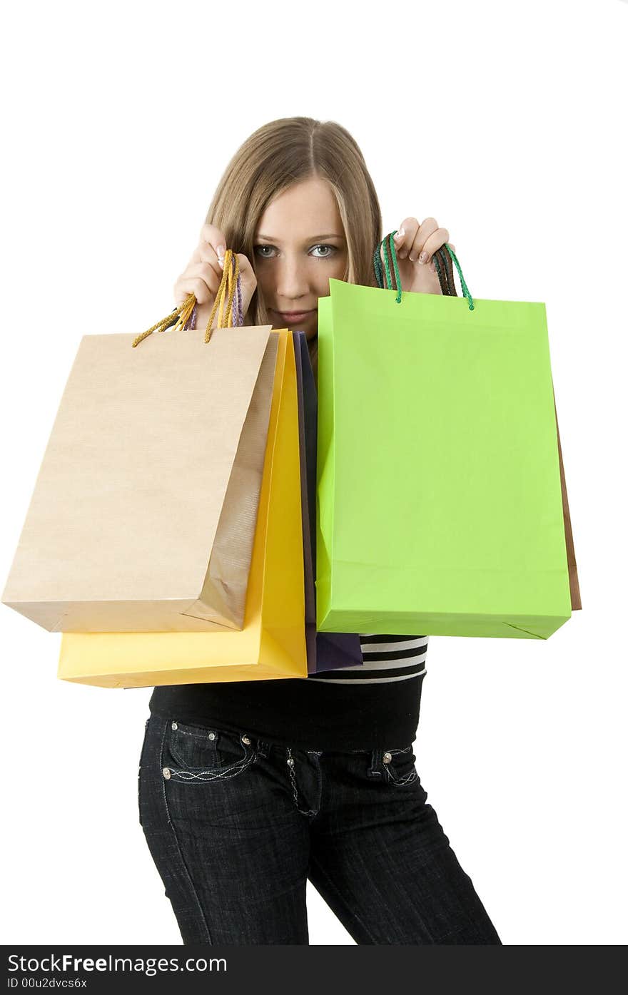 Girl keeping bags with purchases. Girl keeping bags with purchases