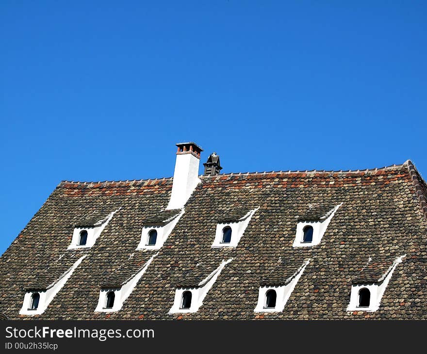 Historic Traditional Normandy roof of a house in a French village. Historic Traditional Normandy roof of a house in a French village