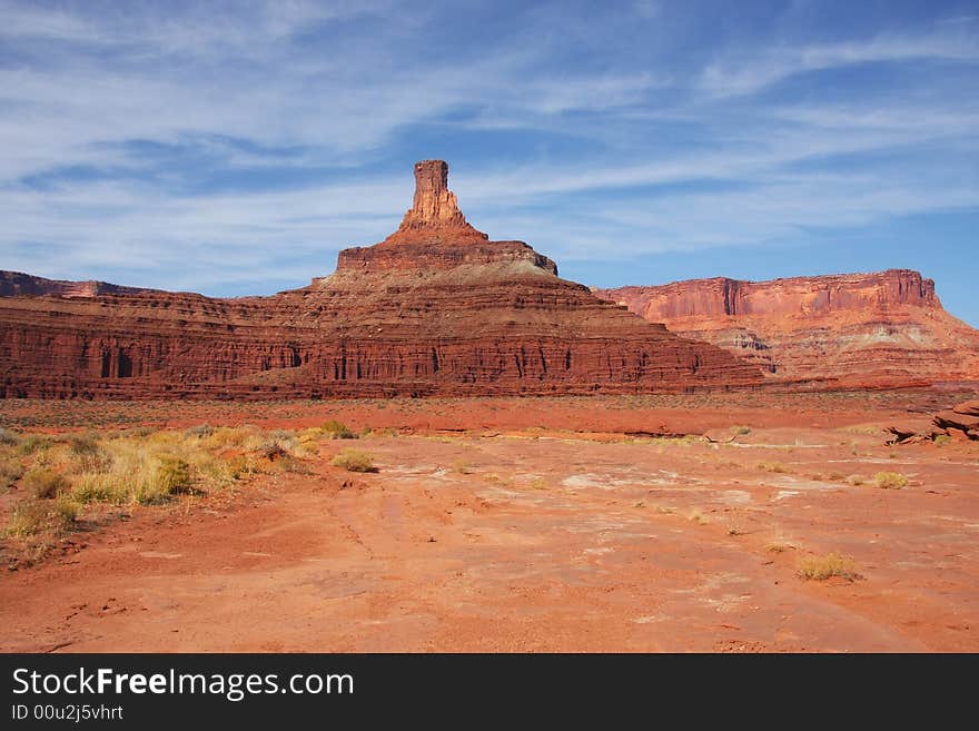 View of the red rock formations in Canyonlands National Park with blue sky�s and clouds. View of the red rock formations in Canyonlands National Park with blue sky�s and clouds