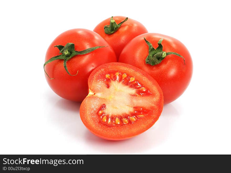 Fresh tomatoes with cut on white background