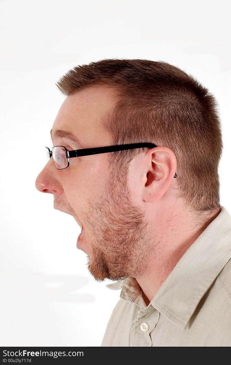 Man with glasses screaming on white background. Man with glasses screaming on white background