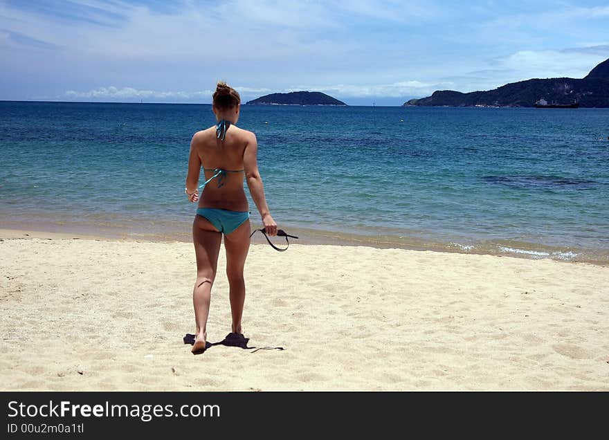 Young woman playing on the beach. Young woman playing on the beach