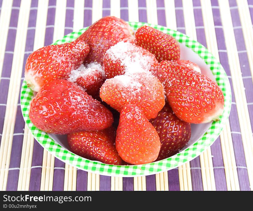 You have fresh strawberries in the bowl