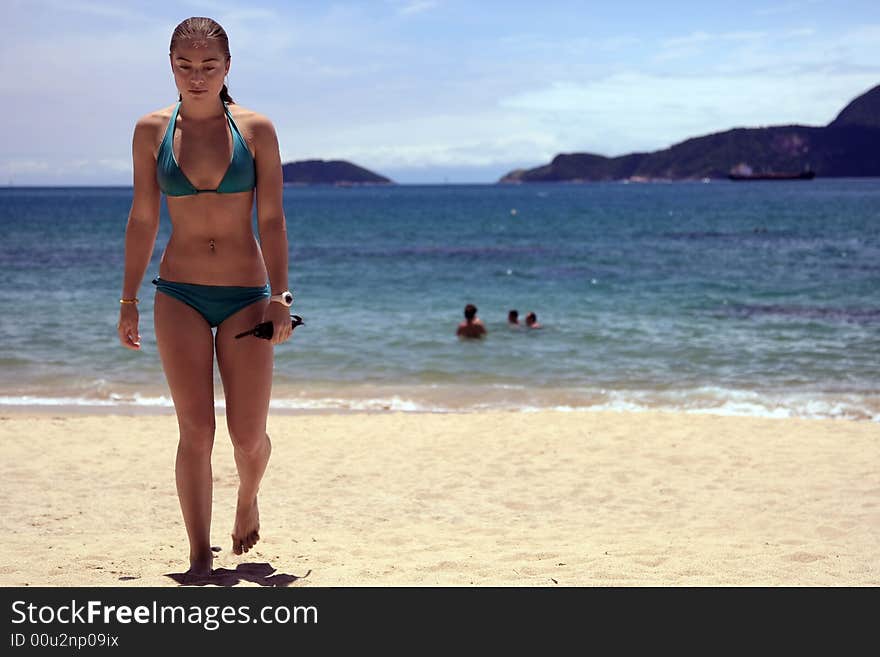 Young woman playing on the beach. Young woman playing on the beach