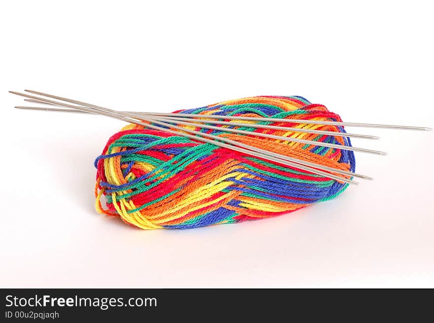 Knitting needles and wool ball