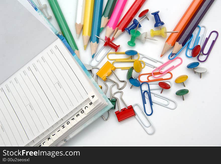 A pack of colour pencils and notebook