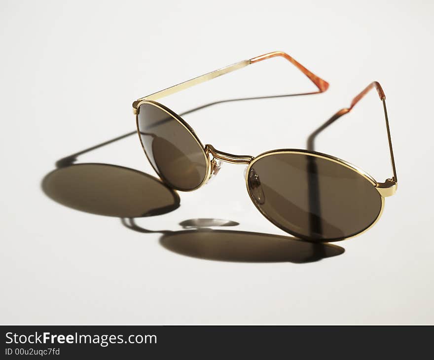 Tinted sun-glasses with shadow. Tinted sun-glasses with shadow