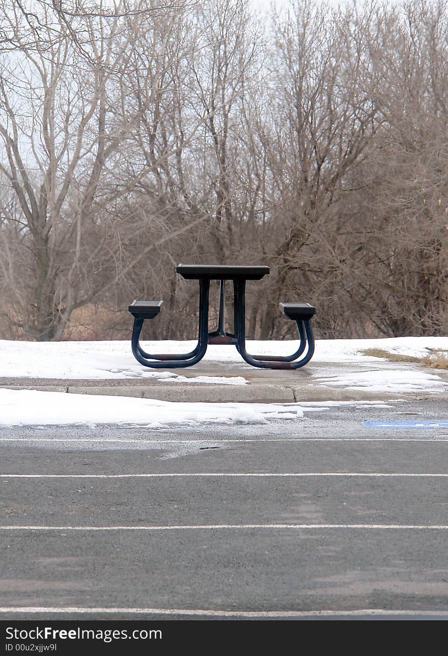 Picnic table in woods in early spring