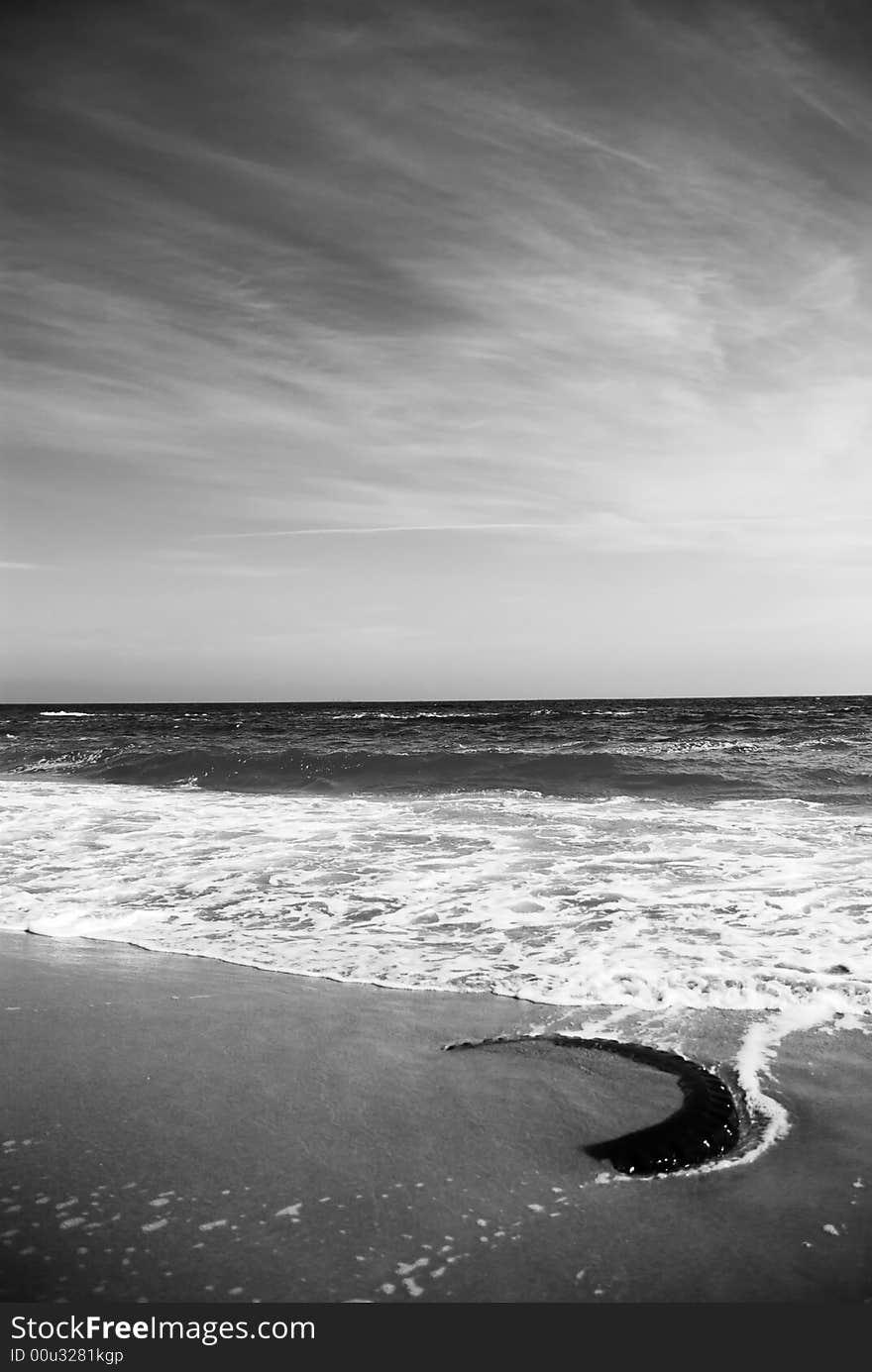 Wheel at the beach in sea