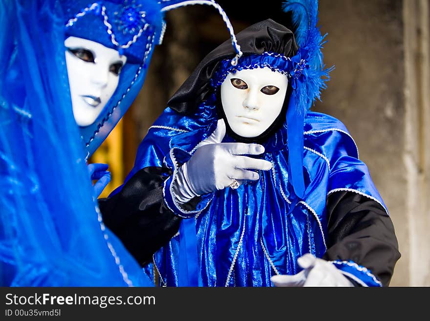 Two people in costume at the Venice Carnival. Two people in costume at the Venice Carnival