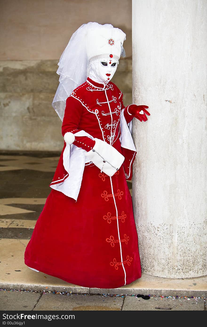 Red velvet costume at the Venice Carnival