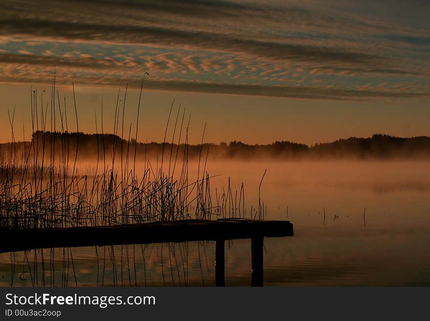 Pier in the morning mist