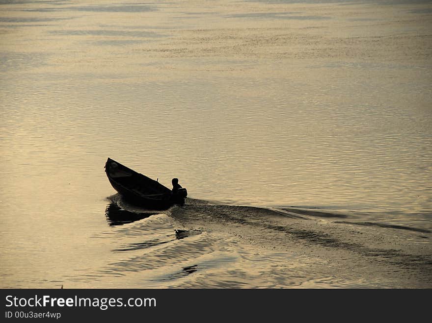 A boat on the sunset