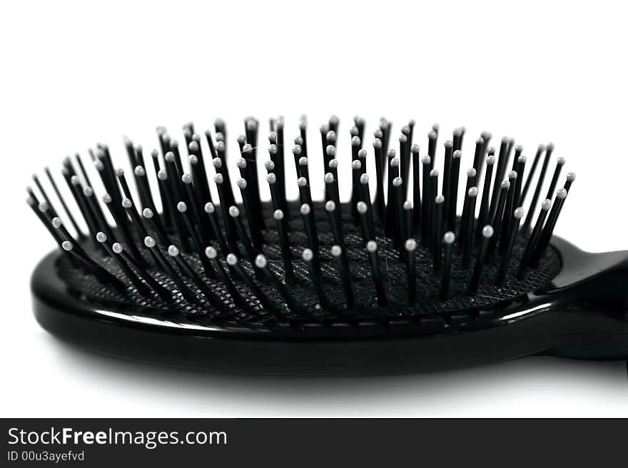 Black comb isolated on white. Black comb isolated on white