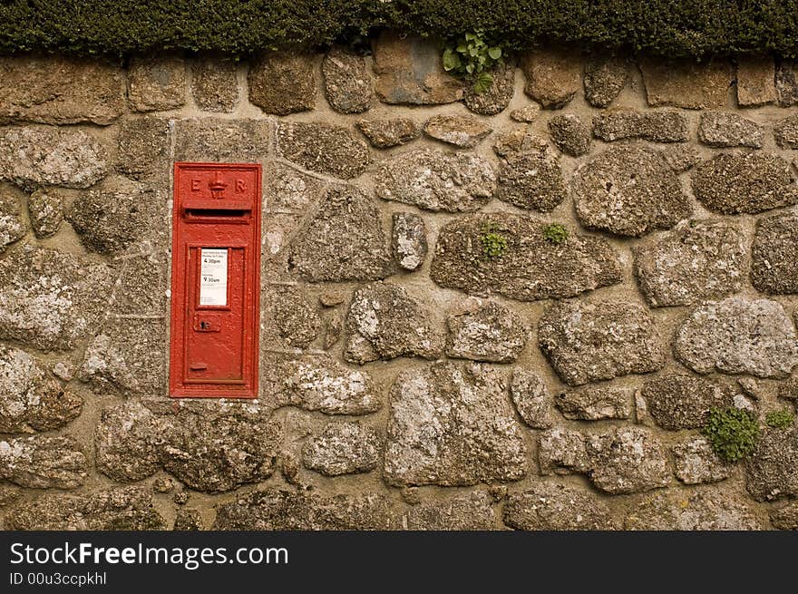 Red Postbox In English Village Wall