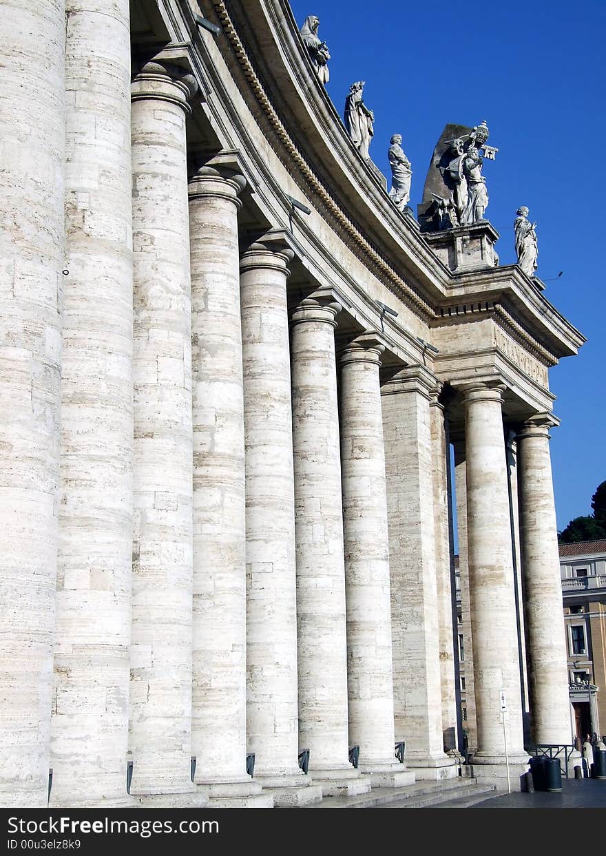 The columns and statues in the square of The Vatican. The columns and statues in the square of The Vatican.