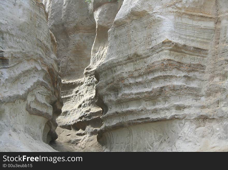 Close up of striated rocks on cliffs at the beach. Close up of striated rocks on cliffs at the beach.