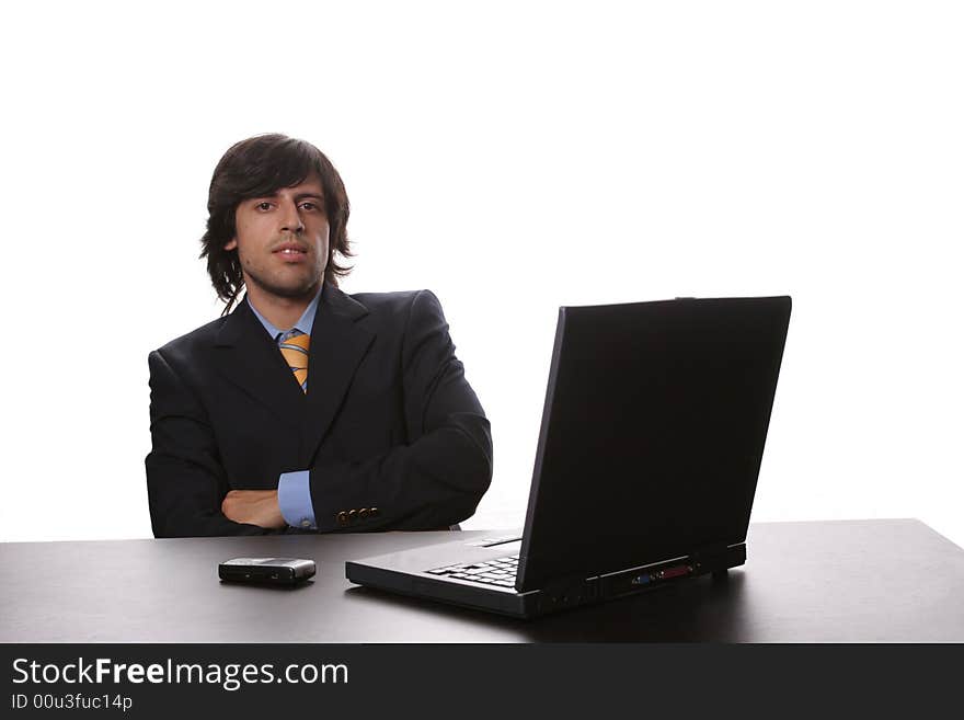 Young business man working on laptop isolated on white background