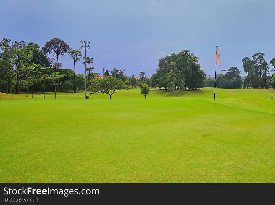 A view of a golf course. A view of a golf course