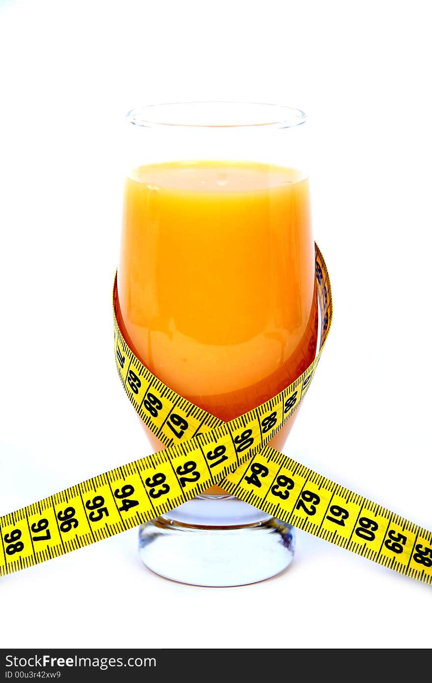 Orange juice and measuring tape on white background. Orange juice and measuring tape on white background.