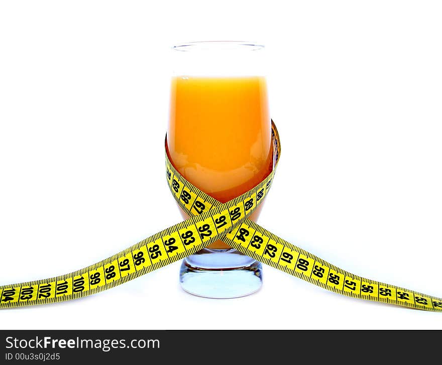 Orange juice and measuring tape on white background. Orange juice and measuring tape on white background.