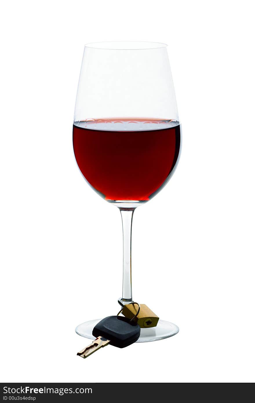 Concept photo to drink wisely, using a glass of wine and keys. Concept photo to drink wisely, using a glass of wine and keys.