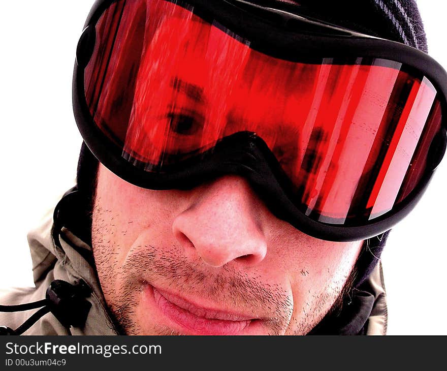 Face of a Snowboarder guy in goggles.