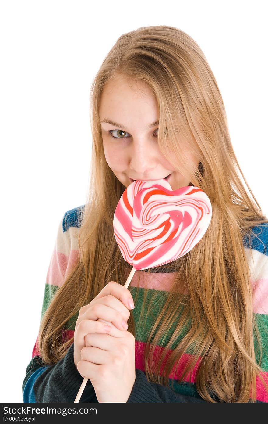 The girl with a sugar candy isolated on a white background